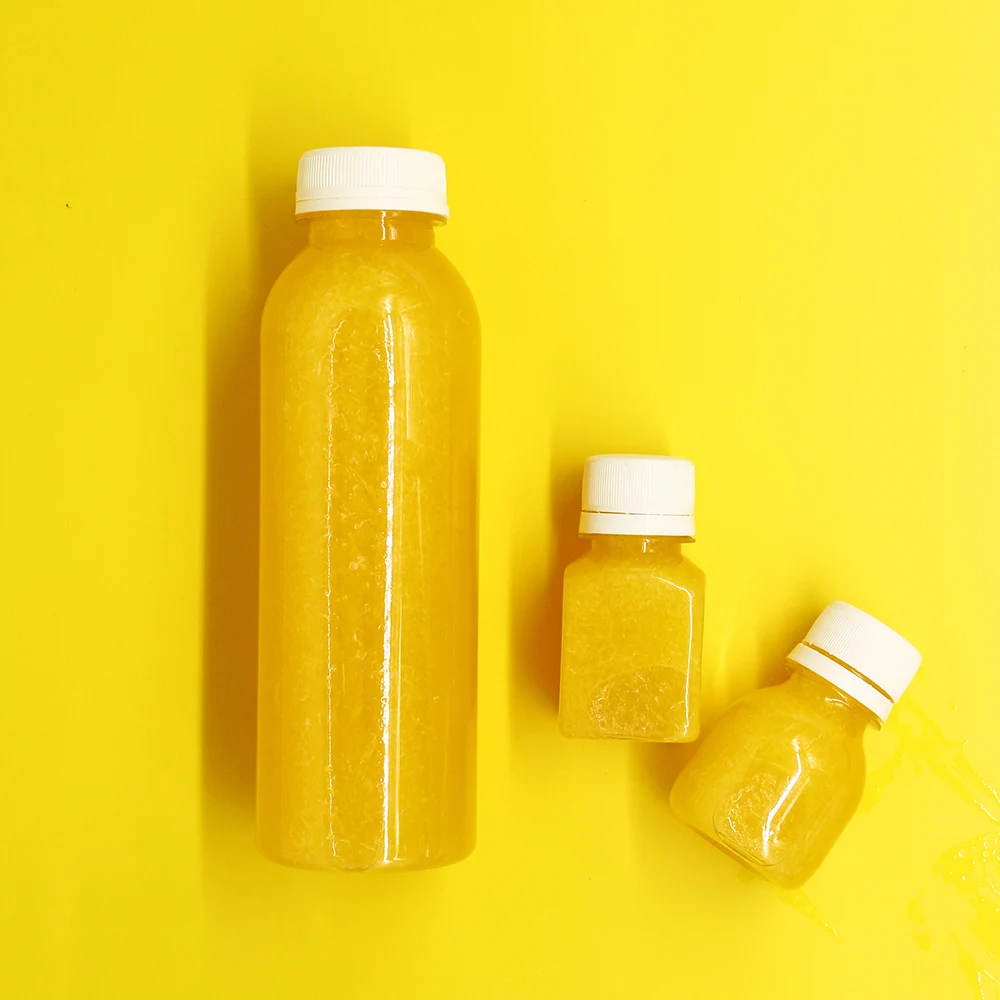 2 oz 60 ml Eco friendly Recyclable Juice Energy Shot Mini Pet Ginger Bottle Energy Cold Pressed Booster Shot Bottle