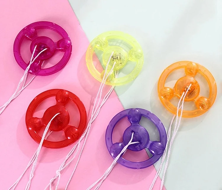 Wholesale cheap classic kids toy luminescent Pull Rope LED flywheel toy for kids