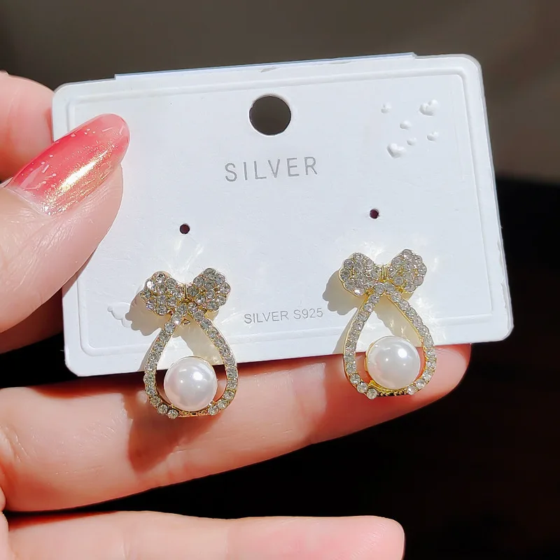 South Korea multi-match rhinestone pearl bowknot eardrop INS net red star earrings with female long temperament earpiece