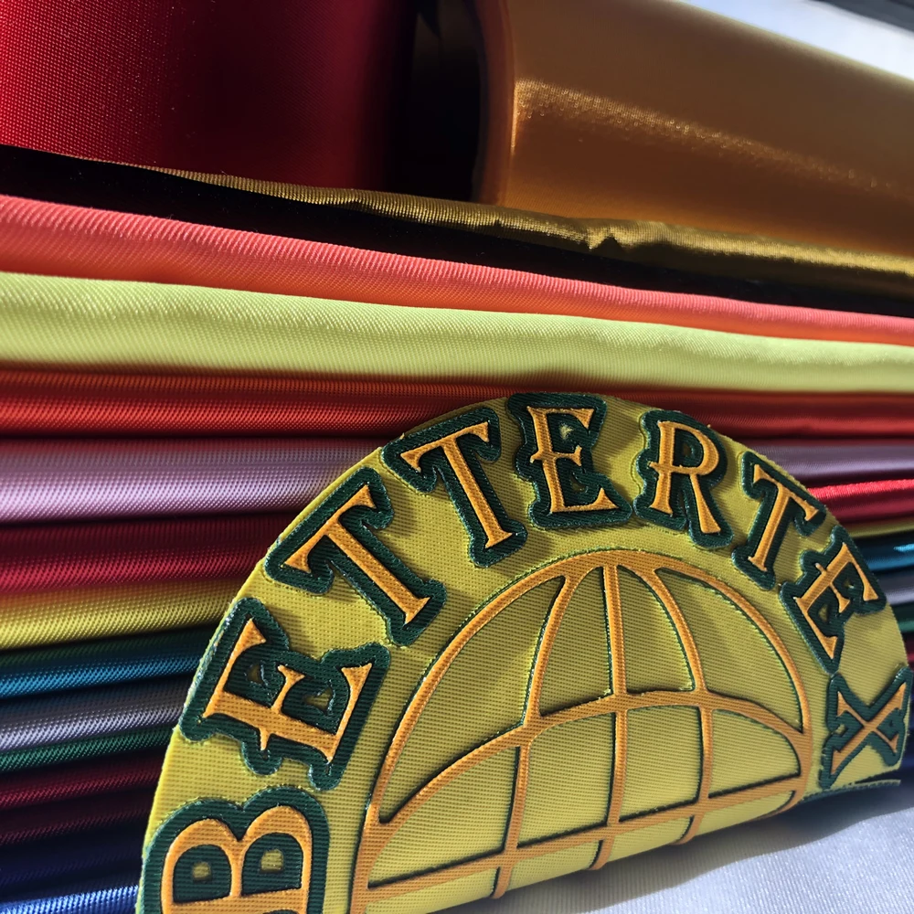 TBT2091601S  Adhesive Backing  Poly twill  fabric  for Laser Cut Letters for Sports uniform Use  pressure sensitive fabric