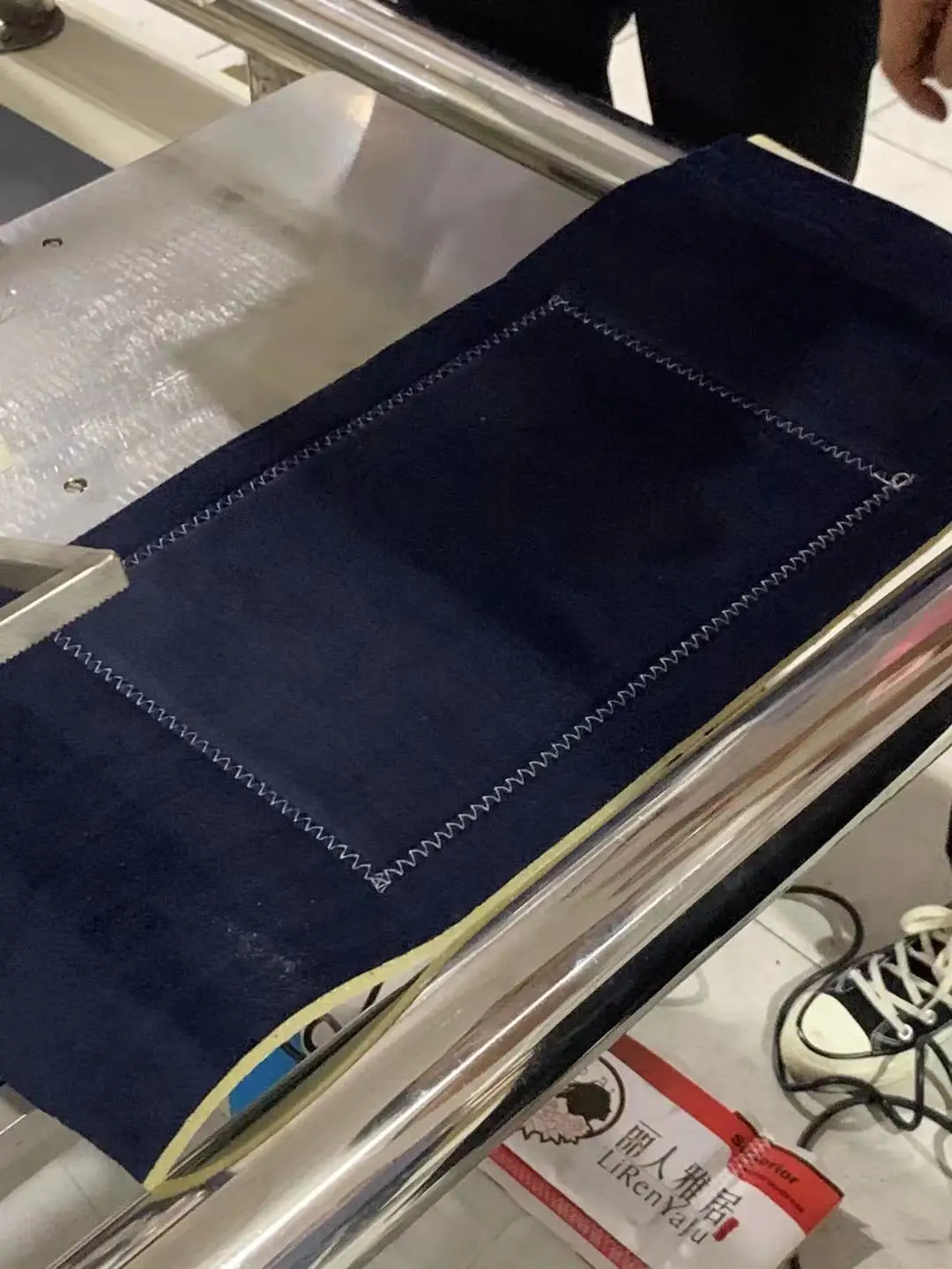 AUTOMATIC LABEL SEWING MACHINE
