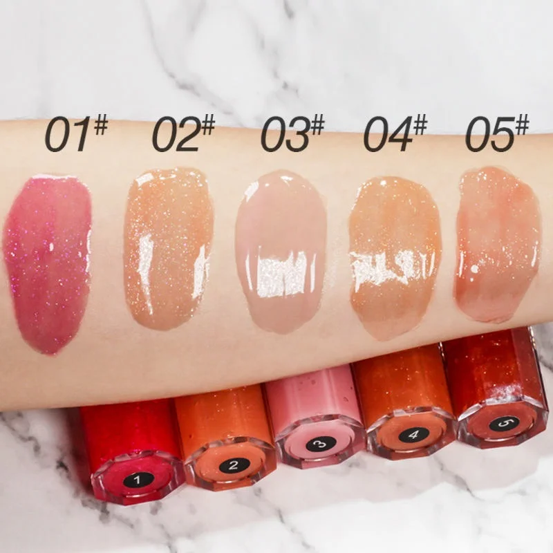 Wholesale lip plumping moisturizing vegan lip plumper private label glossy lip gloss