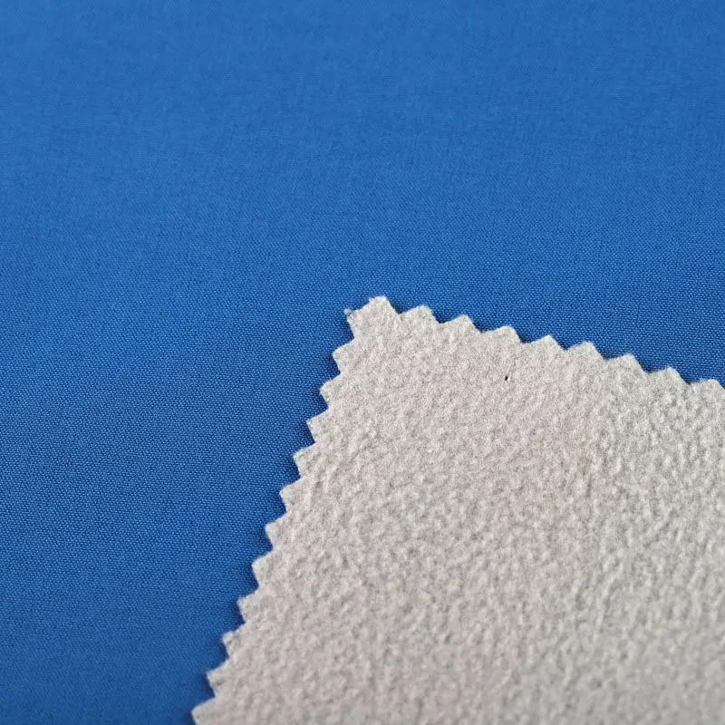 Shaoxing yuyuan imp four way stretch jacket waterproof kuma softshell fabric