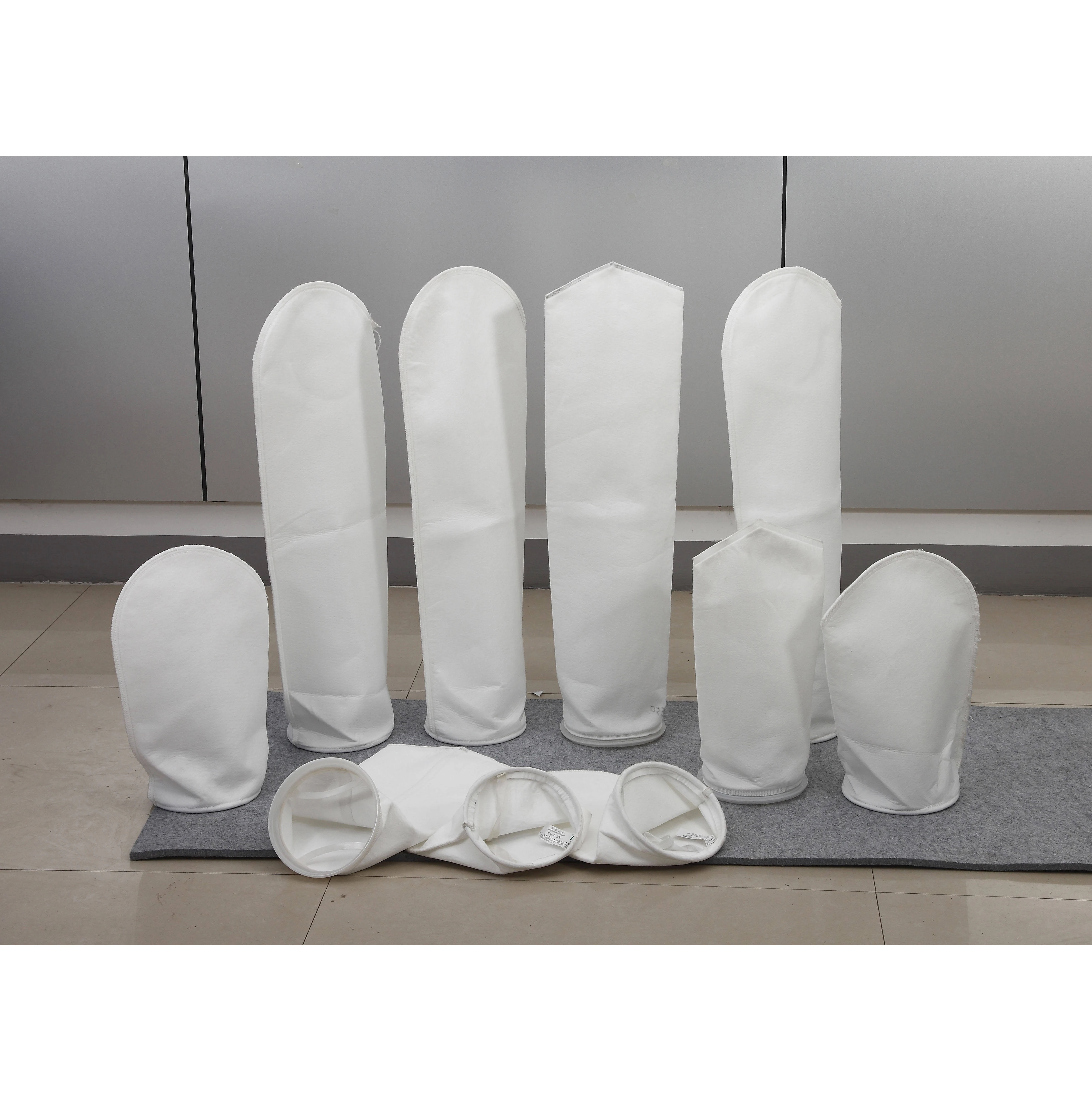 China Manufacturer 0.5,1,5,10,25,50,75,100,150,200 Micron Polyester Needle Felt Liquid Filter Bags