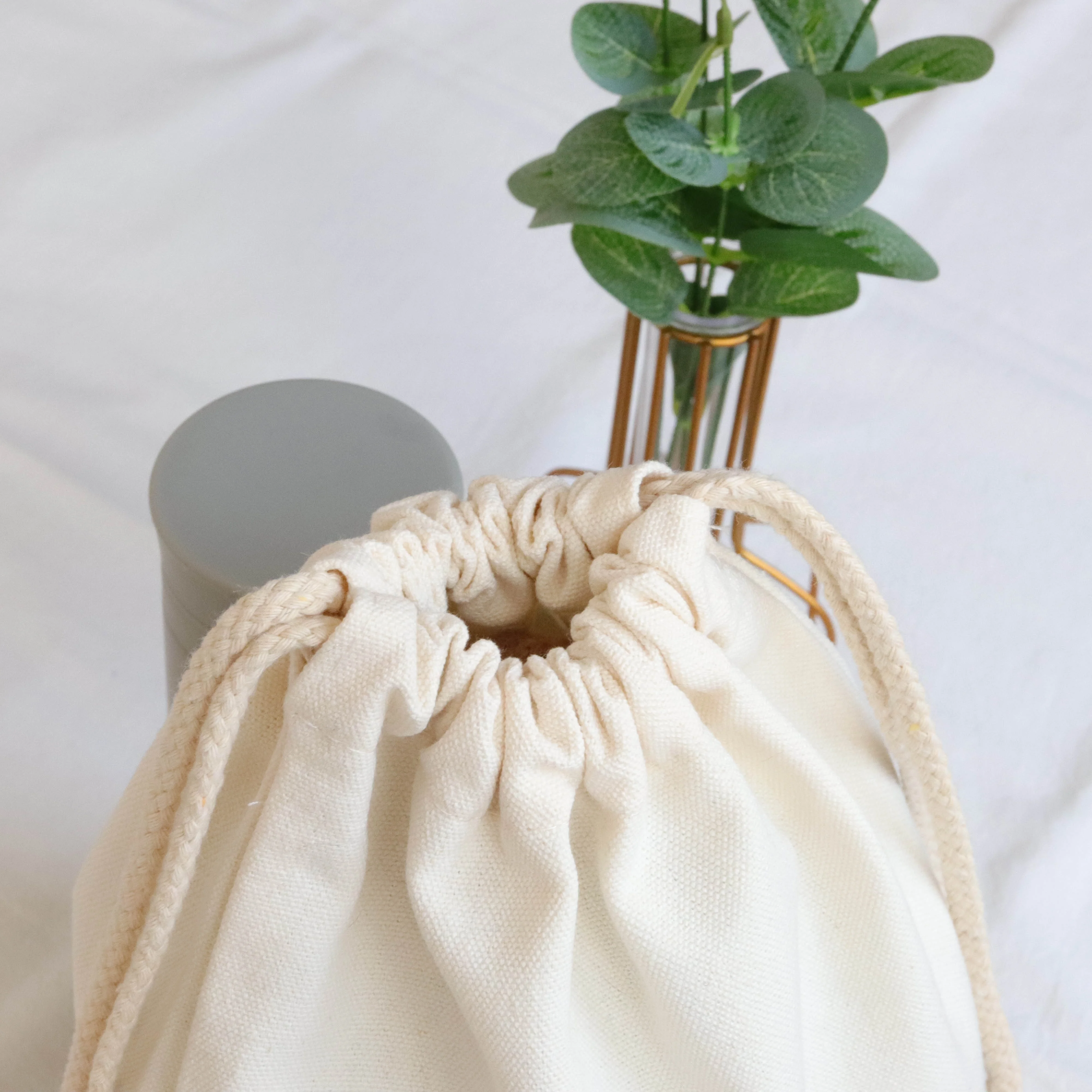 Ecofriendly large natural beige cotton canvas dust pouch with black logo printed hats handbag package drawstring bag