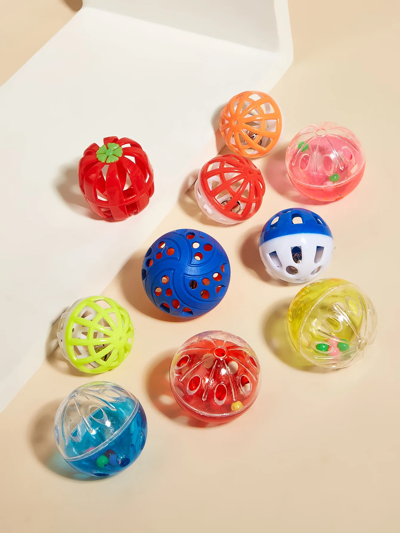 2024 hot-selling Cute creative hollowed out plastic cat pumpkin ball interactive toy with bell colorful bell plastic ball