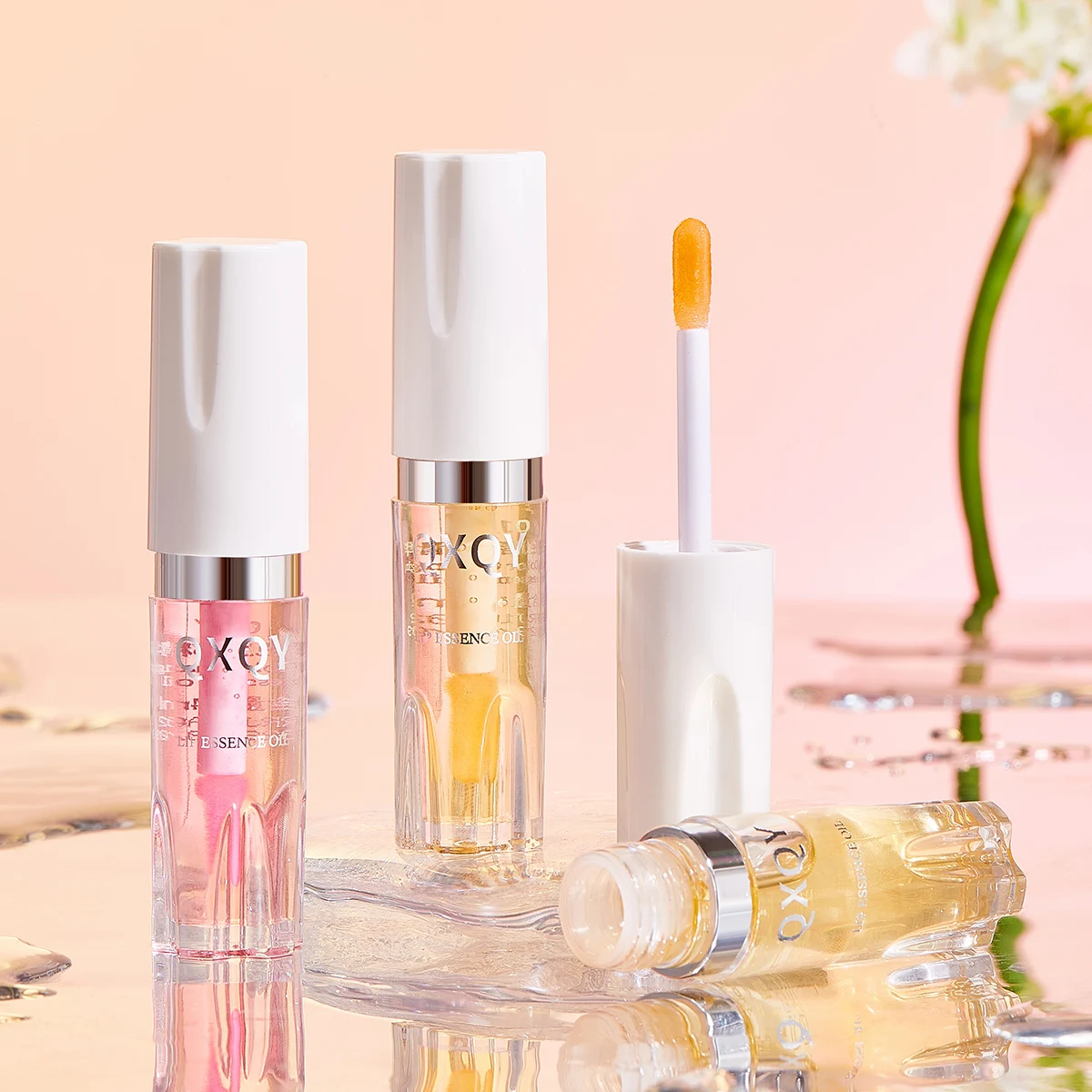 QXQY OEM ODM Wholesale Base Lip Gloss Moisturizing And Glossy Lip Care Layering Light Color Changing Lip Essence Oil