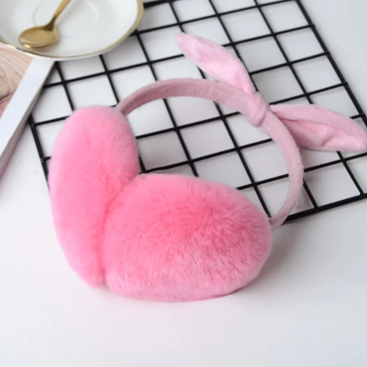 Korean version of the new cute rabbit ears bow hair ear earmuffs lady winter super warm warm earmuffs Rabbit ear modeling