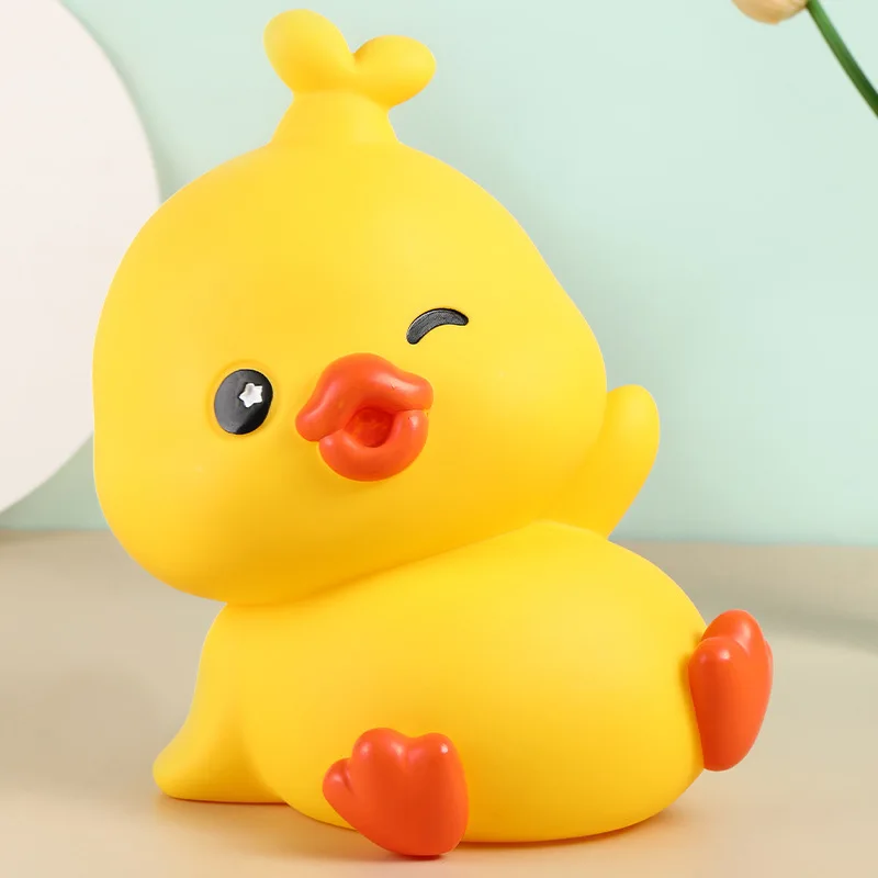 The new Doodoo Duck cartoon piggy bank can store online celebrities large piggy bank gifts for girls and children gifts