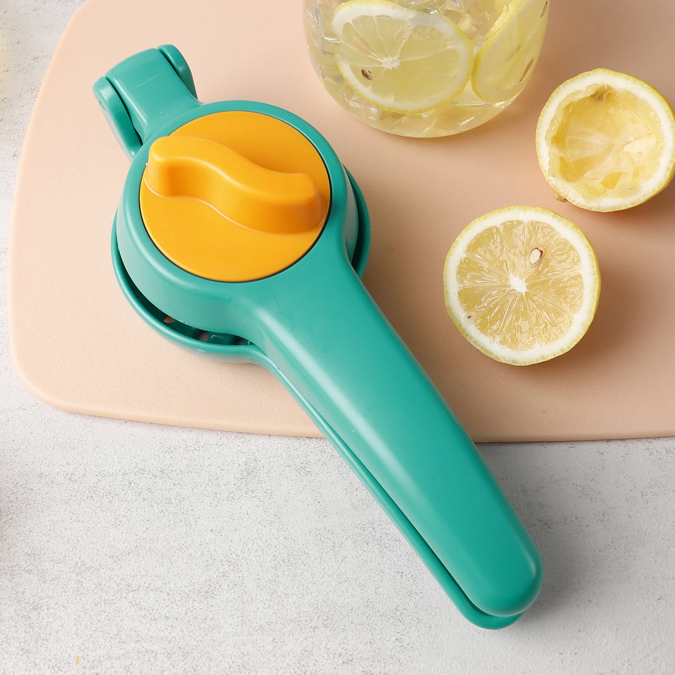 Hot sales commercial hand held press juice food grade manual plastic fruit lemon squeezer handheld juicer
