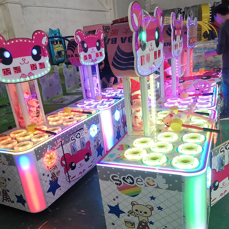 Two-person whack-a-mole coin-operated game machine