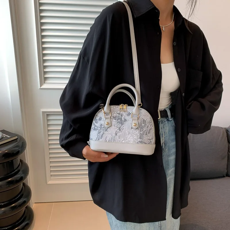 2024 Unique Women Fashion Luxury Shell Shape Designer Handbags Famous Brand for Ladies