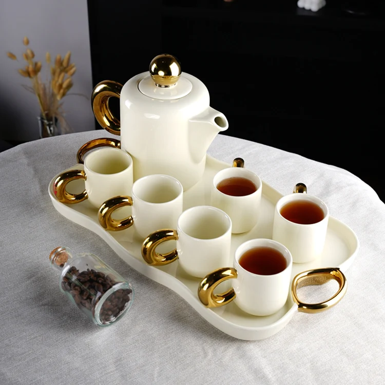 Modern nordic new design luxury gold and white ceramic set of cups tea pot and tray coffee and tea sets