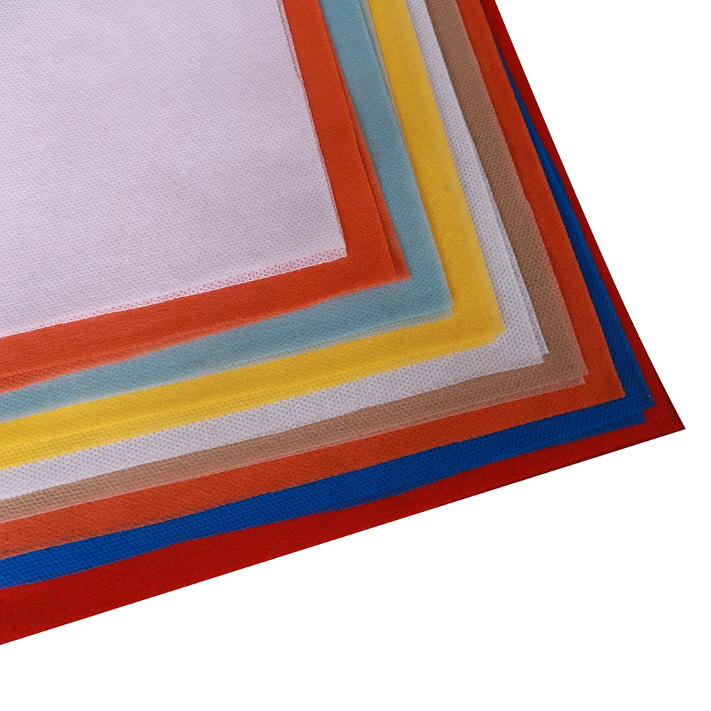 Non Woven Fabric Bag tie Interlining Spun bond Polypropylene non woven  color shopping bag production  material