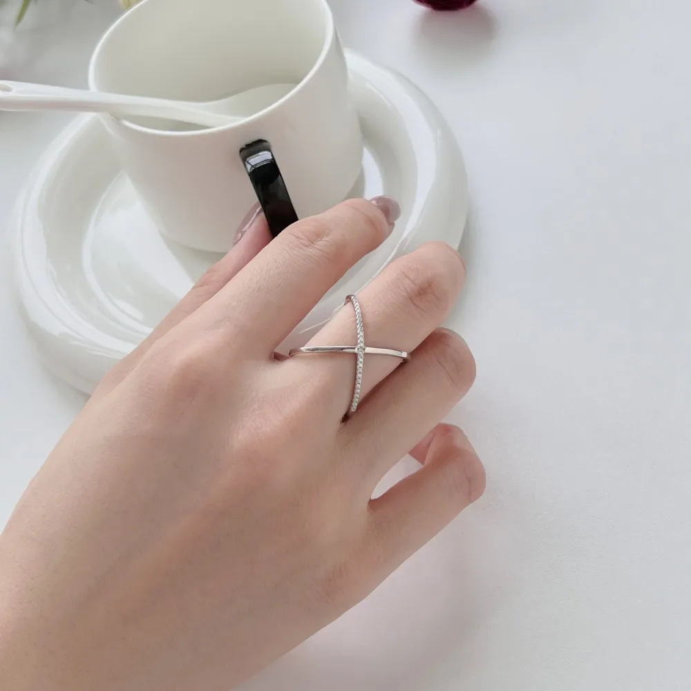 Dylam Simplicity Design 925 Sterling Silver Rhodium Plated Cross Interlock 5A Cubic Zirconia Jewelry Rings for Women Dress Up