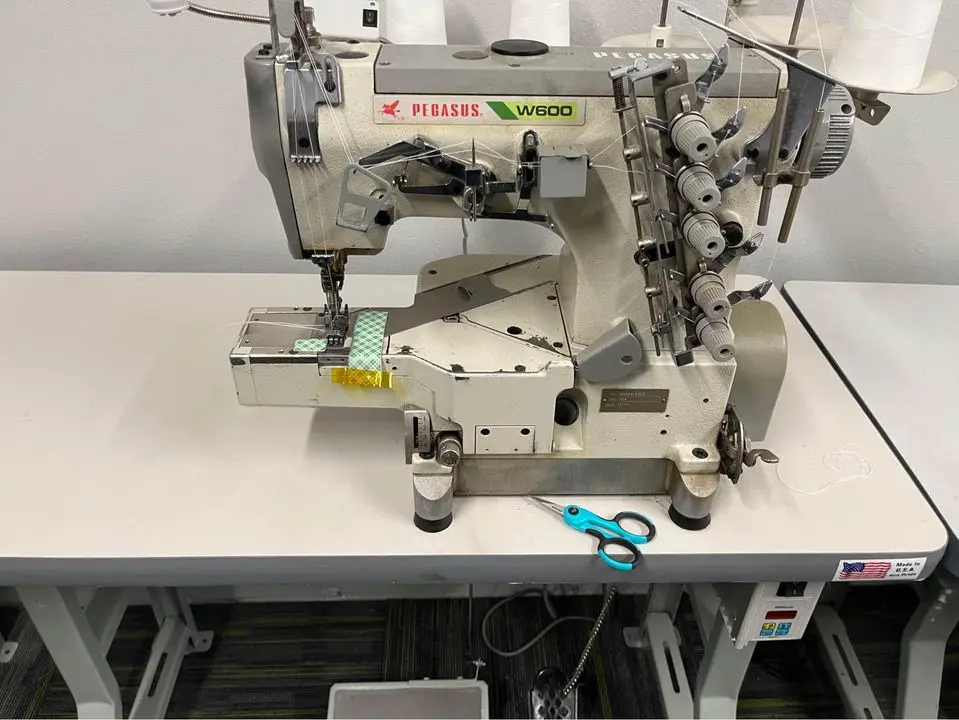 Up for Sale Used PEGASUS W600 3-needle 5-thread Industrial Cover Stitch Sewing Machine Good Working Condition