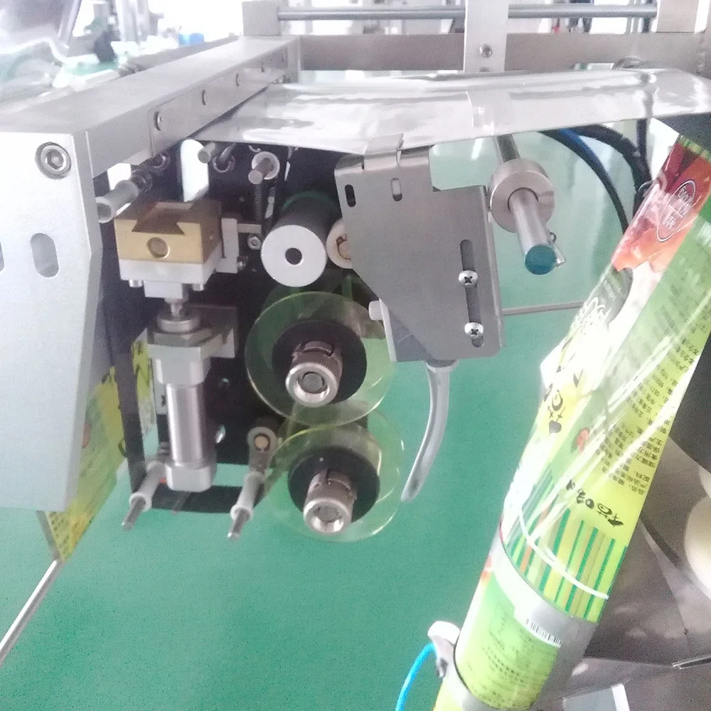 Granular Materials Seeds Cereal Peanut Candies Desiccant Sugar Feed Packing Machine For Pillow Type Bag Sealing