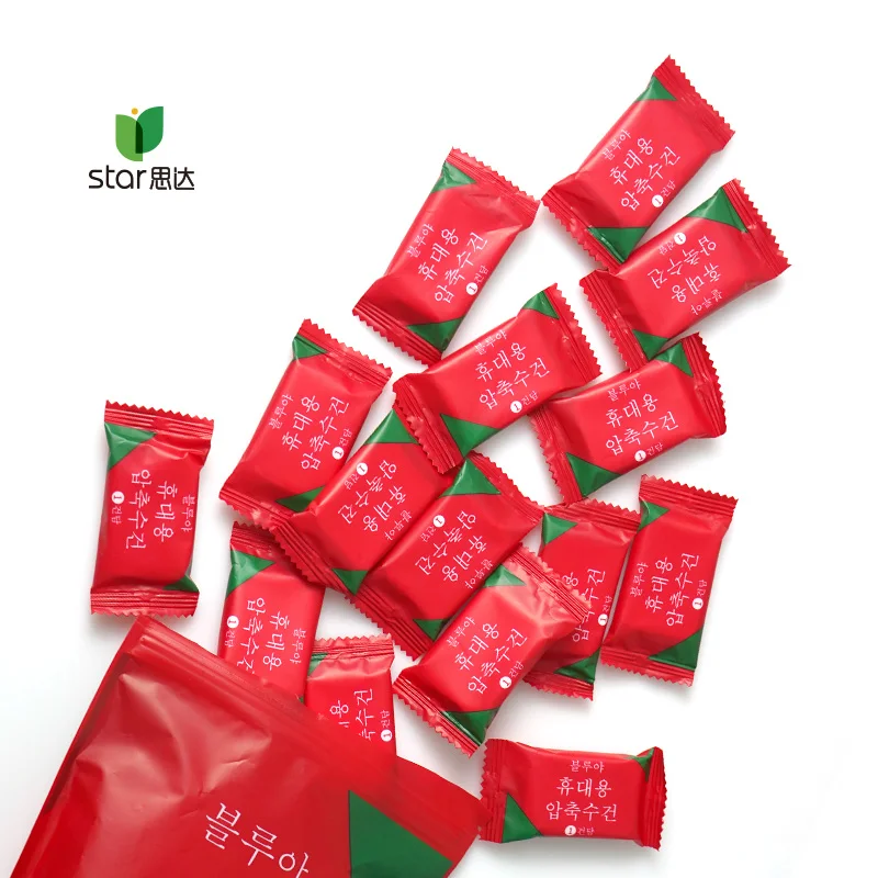 Wholesale OEM high quality compressed disposable towels soft smooth Candy individual packing compressed face towel