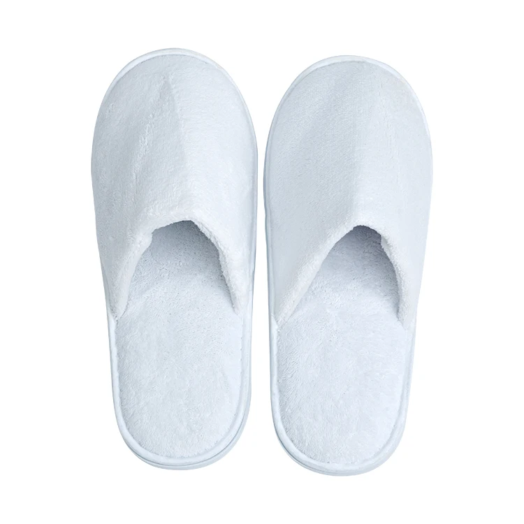 Wholesale cheap prices good selling customized logo and styles sleepers disposable white indoor hotel slippers