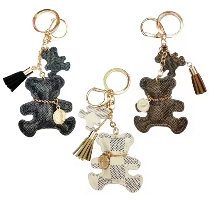 Customized Luxury Designer Leathern Accessories Tassel Pom Pom Keychain Bag  Charm Car Keychain