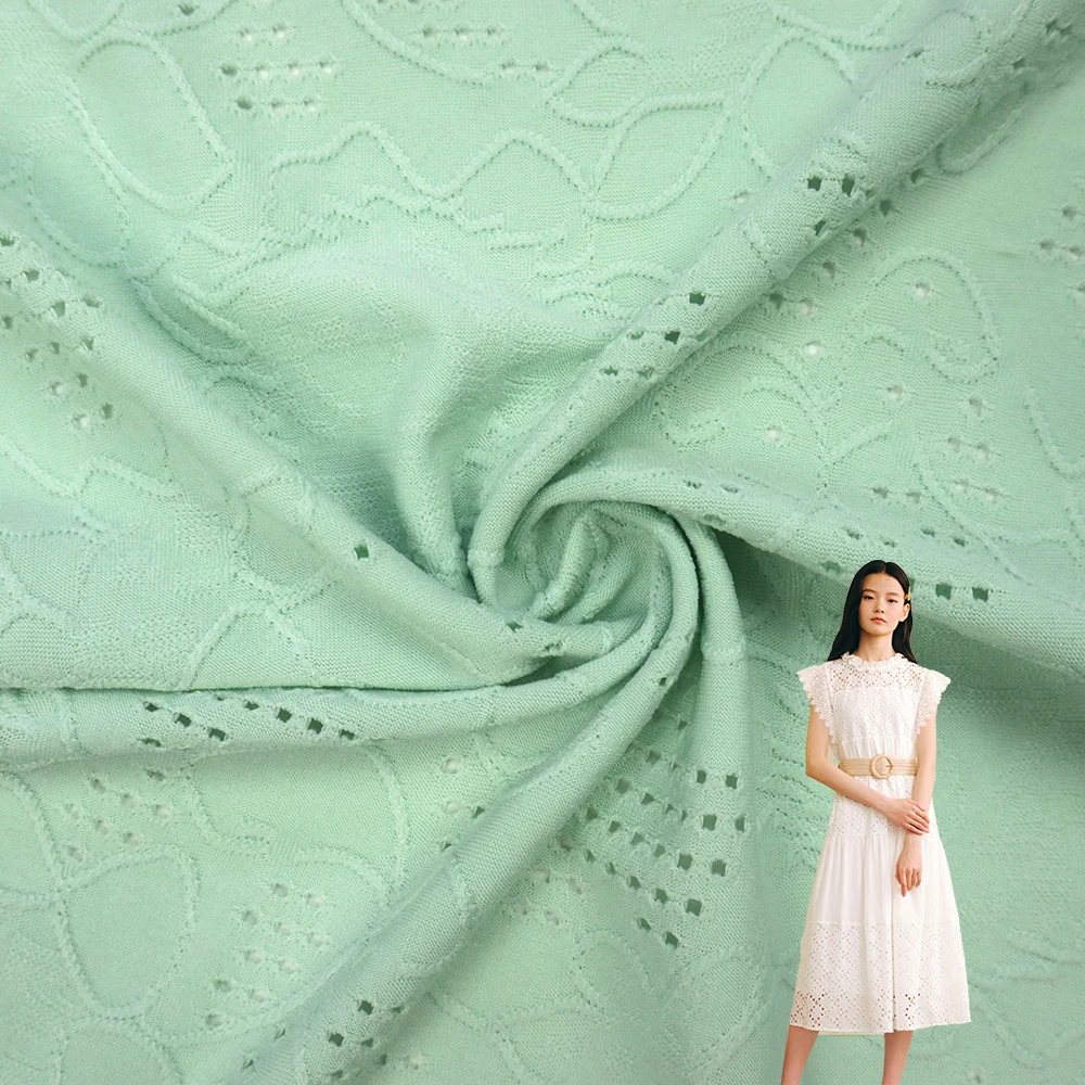 Wholesale textile hole jacquard knitted fabric plain dyed elastane spandex telas punch jacquard fabrics for clothing