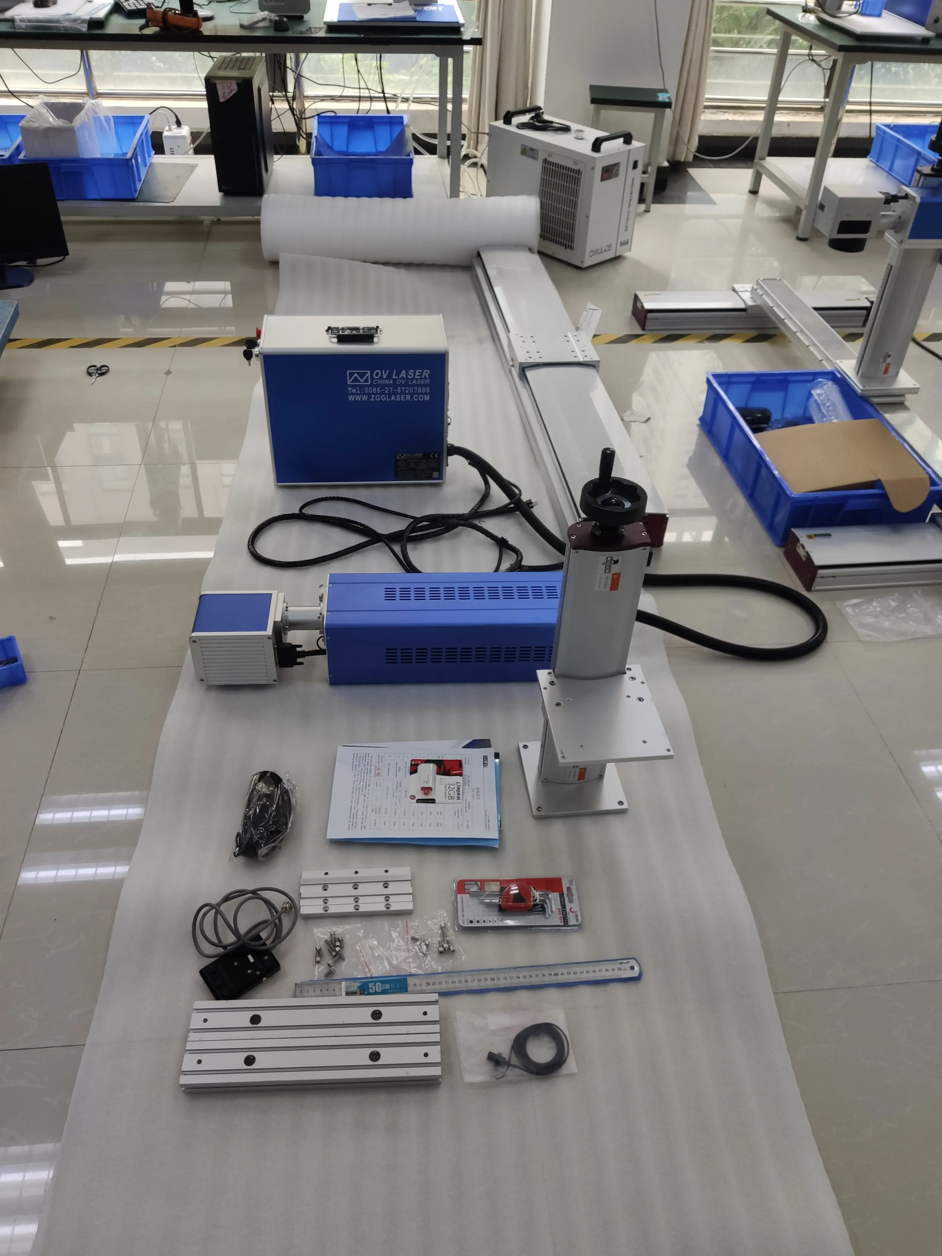 Automatic x y axis moving table laser marking machine 30W raycus 1000*600mm large area laser marking on metal