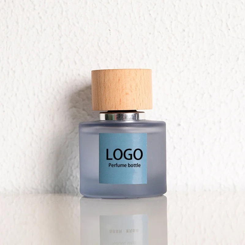 Design Luxury Custom LOGO Fragrance Pump Spray 50ml Round Sprayer Empty Oil Glass Perfume Bottles Packaging