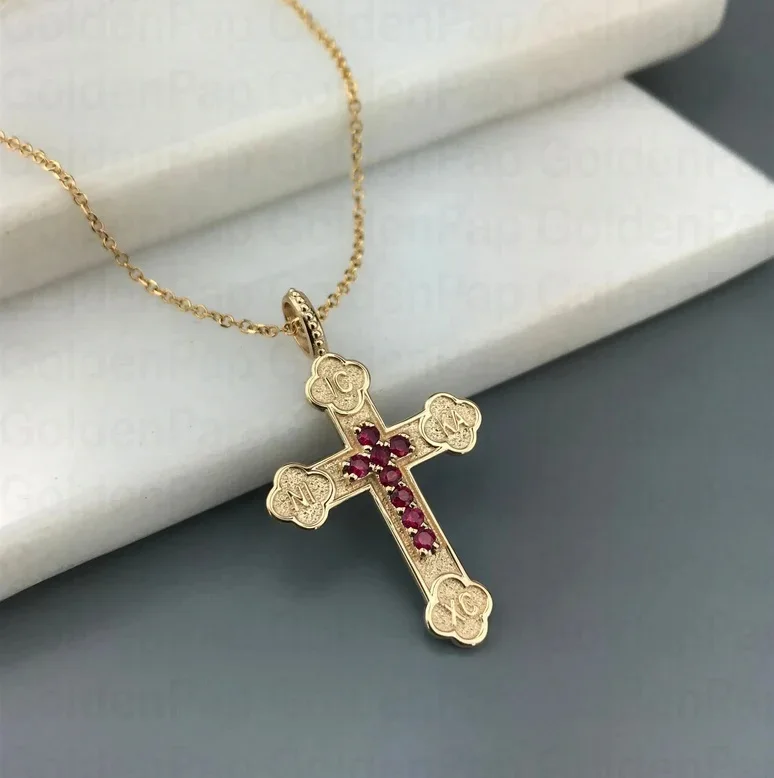 14k solid gold cross with real rubies