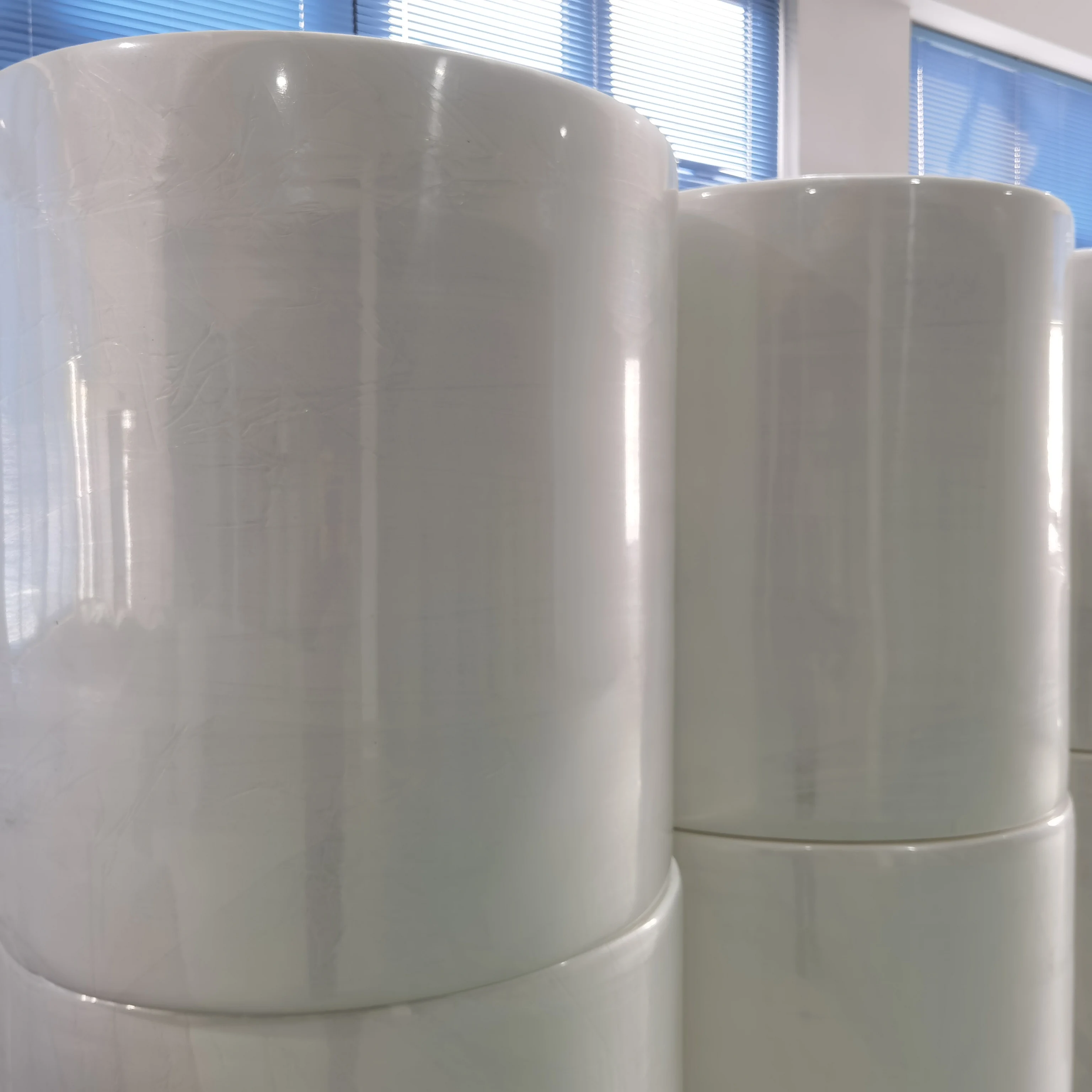 PLA Viscose Spunlance Non woven Plain Emboss Pattern Spunlace Nonwoven Fabric for Tissue Paper