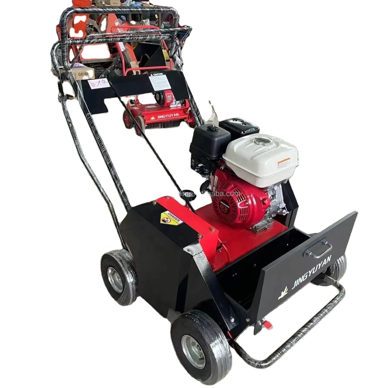 Turf comb machine with manual push to remove dea d grass