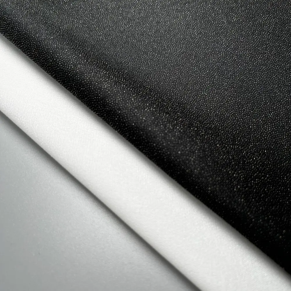 Hot Selling 30Gsm 100% Polyester Woven Twill Fusible Water Jet Loom Coat Interlining Fabric