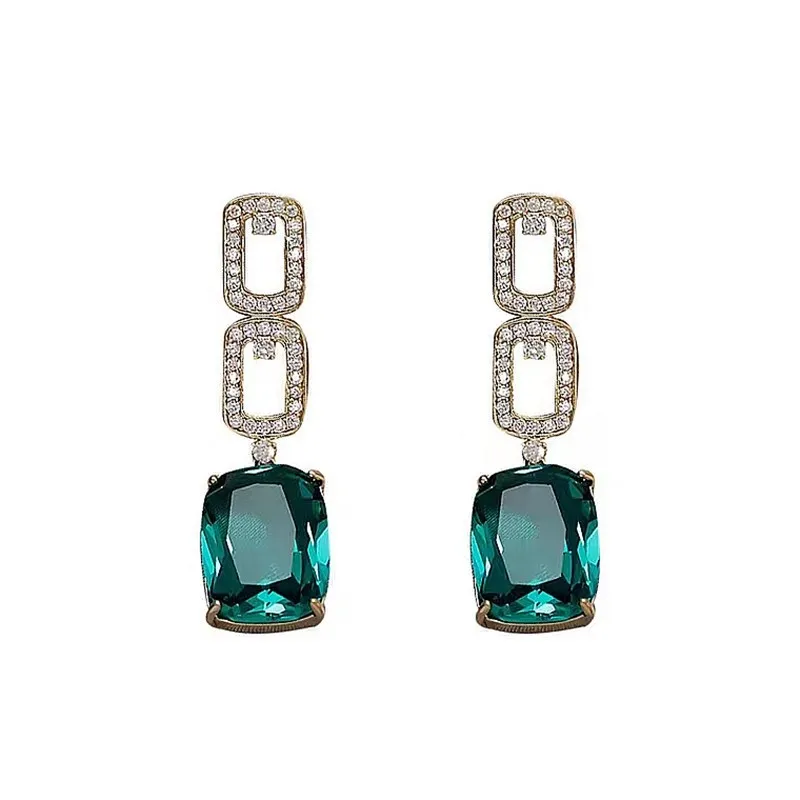 Emerald earrings with geometric diamonds