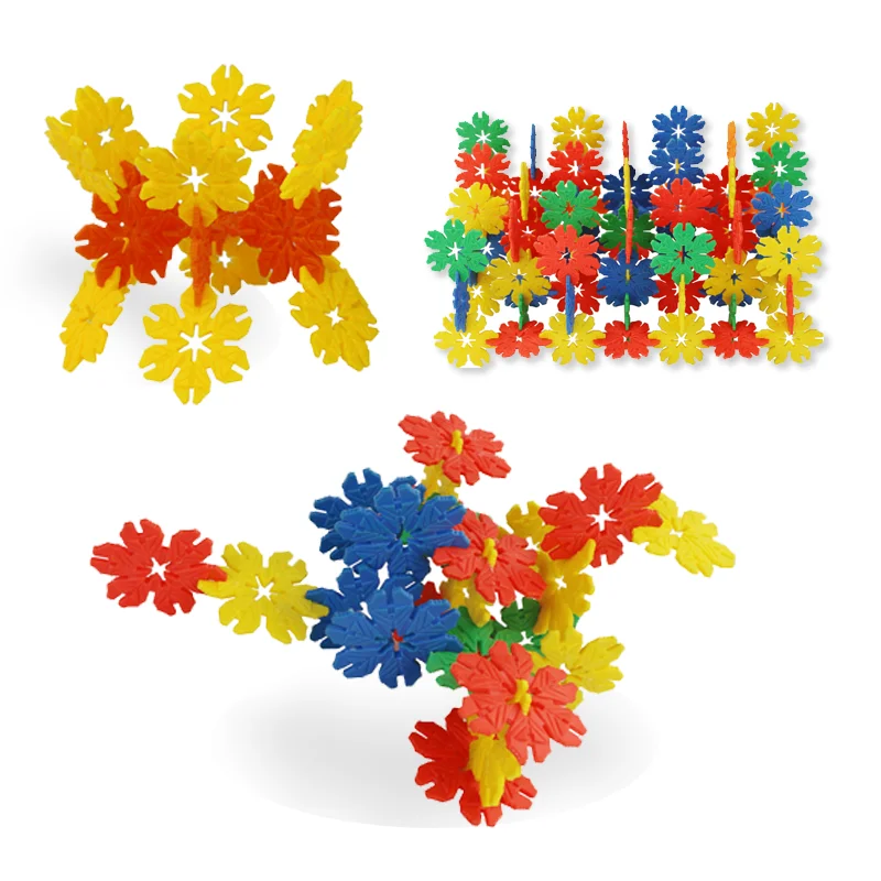 Children boys and girls play together and coordinate creative building block toys