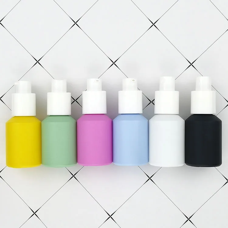 Wholesale 30ml 1oz empty black white blue green yellow pink glass spray pump bottle for cosmetic packaging