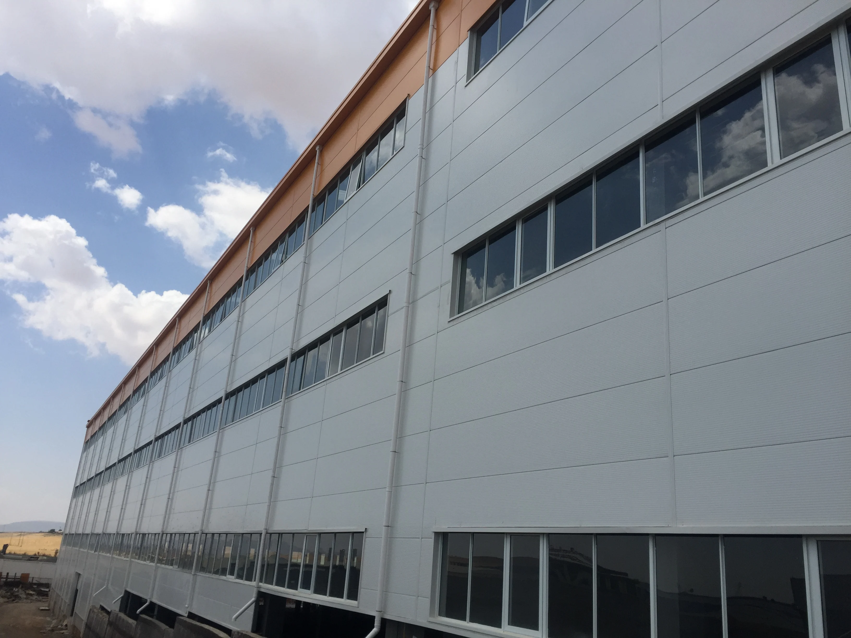 TV Factory Prefab Steel Structure Construction Warehouse Prefabricated Workshop Industrial Shed Free Design Glass Curtain Wall