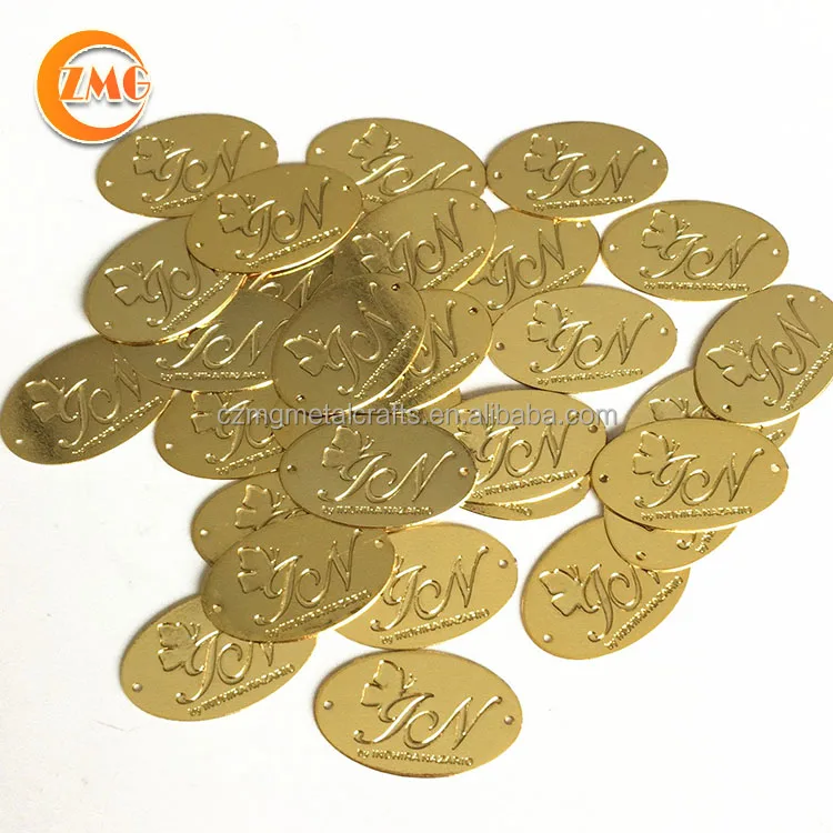 Wholesale high quality gold plated small oval custom metal logo plate for clothing