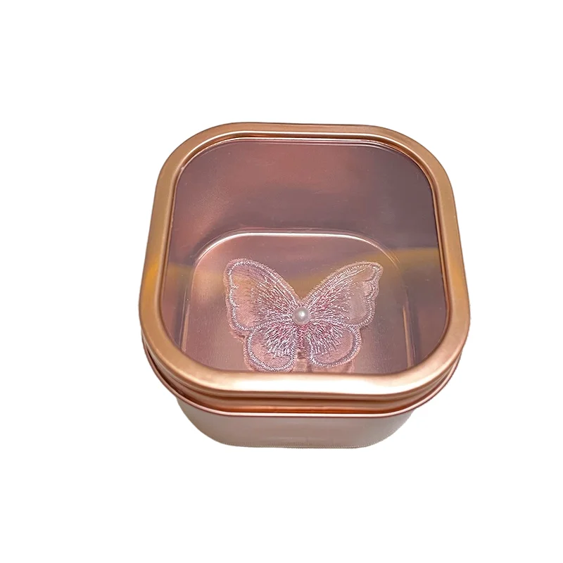 There are metal cans in the window 2oz 4 oz 8 oz candle cans