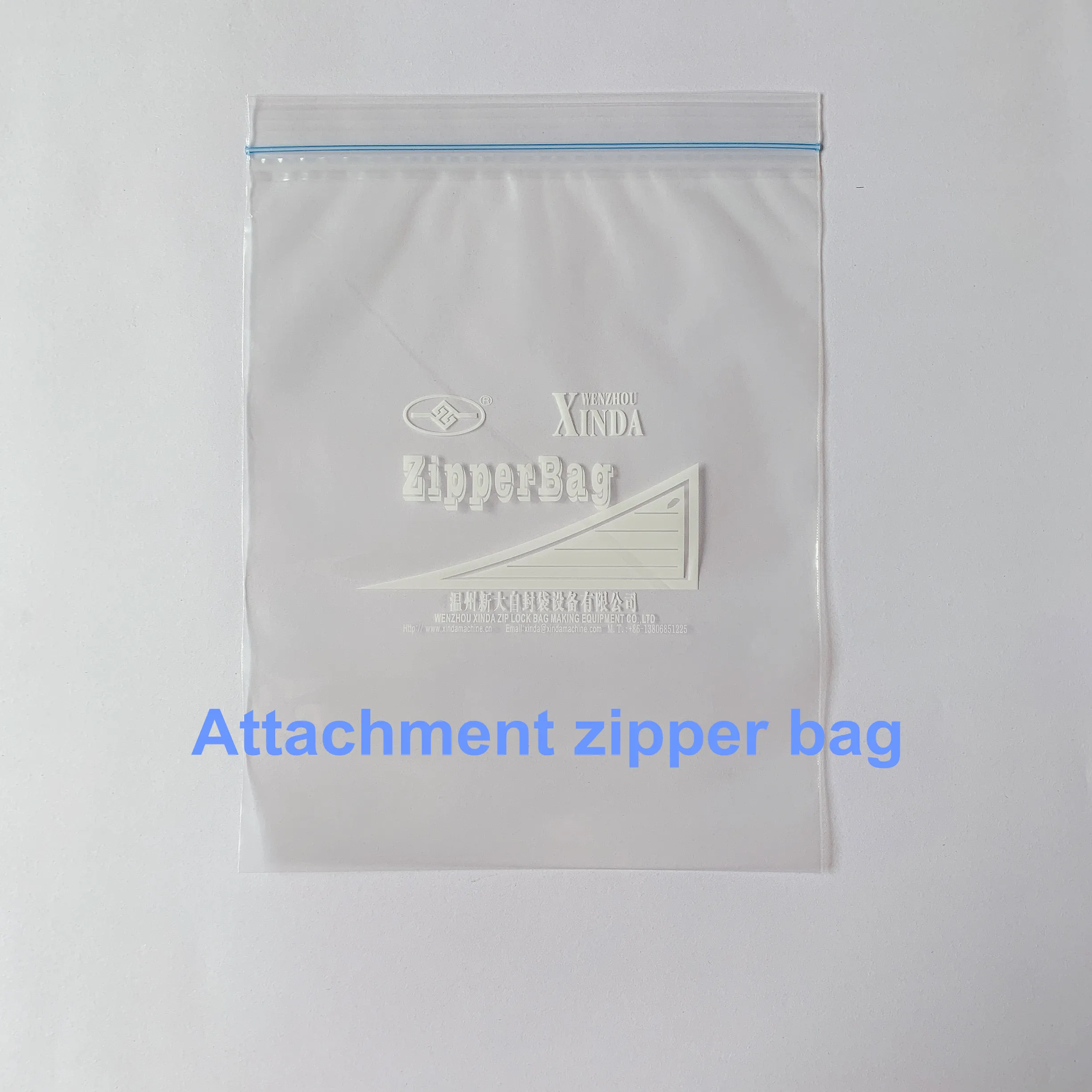 Zipper bag making machine with zipper attachment & auto hanger device cut on the rubber roller