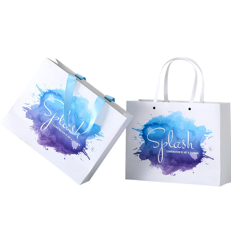 Hongxi OEM Золотая белая подарочная упаковка, большой бумажный пакет, 100 шт., золотые бесплатные образцы на заказ, печать логотипа с ленточной ручкой