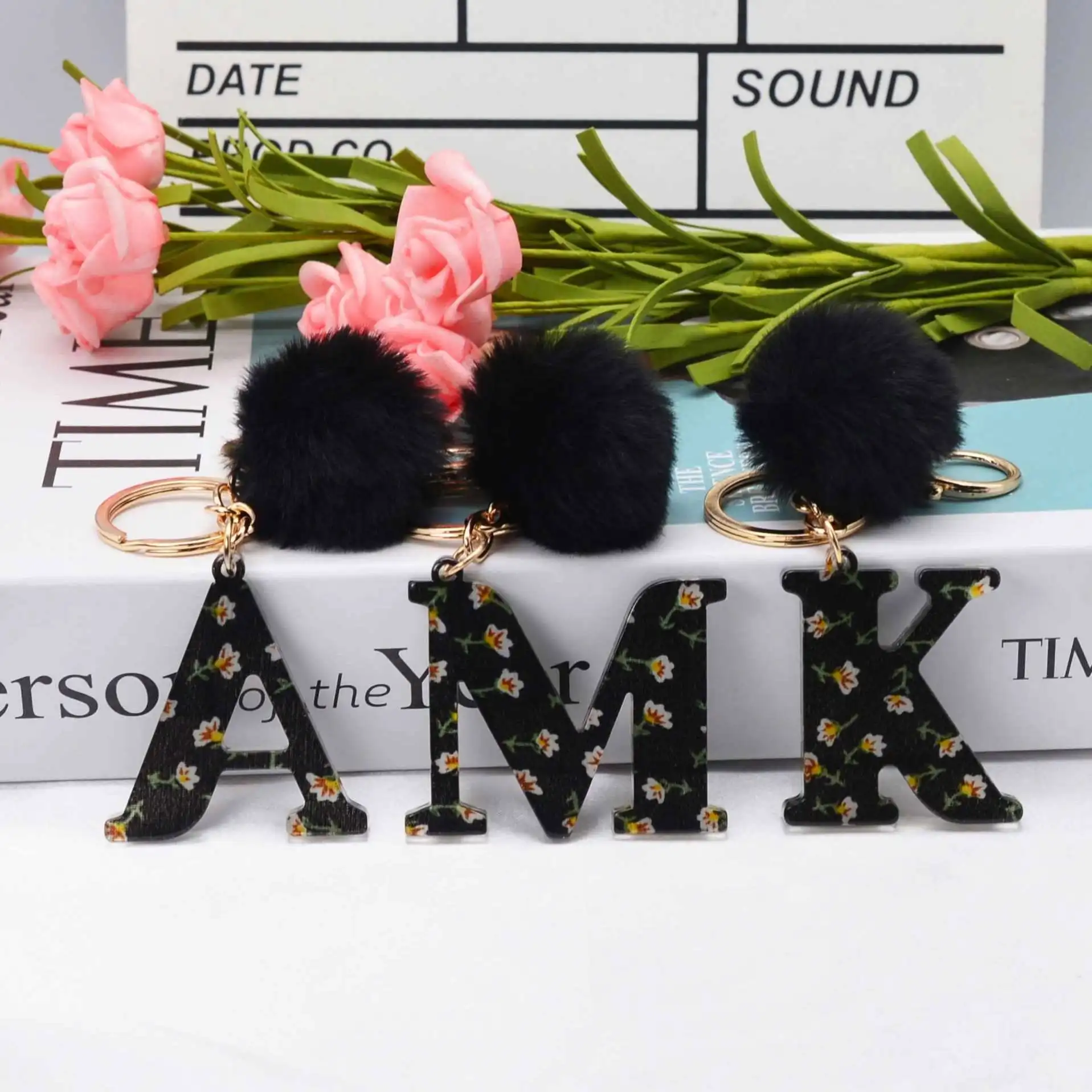 Black resin printed 26 English letter keychains wholesale A-Z  pattern resin initial keychains letter Keyring Pompom Women Charm