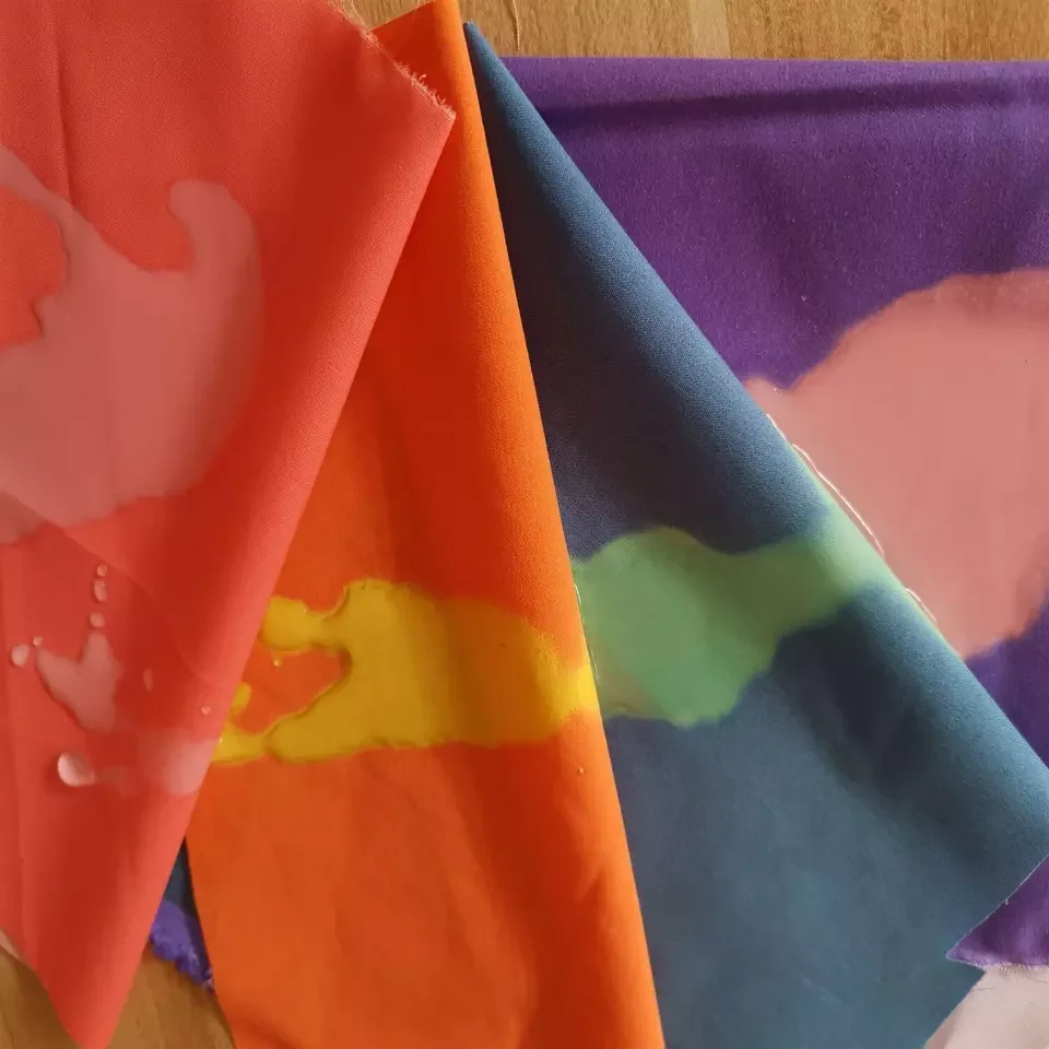 Latest Provide wet water change color custom hydrochromic print peach skin fabric for swimwear raincoat umbrella