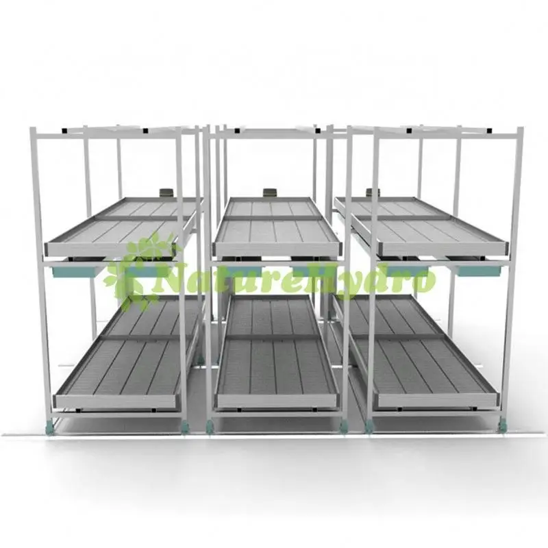 Movable multi level vertical ebb and flow rolling bench rack system with grow tray