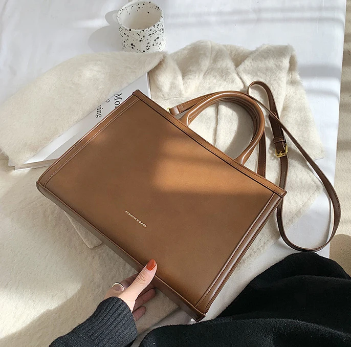 2022 New Arrivals Custom Leather Bags Medium Size Button Long Strap Work Tote Bag Women Hand Bags