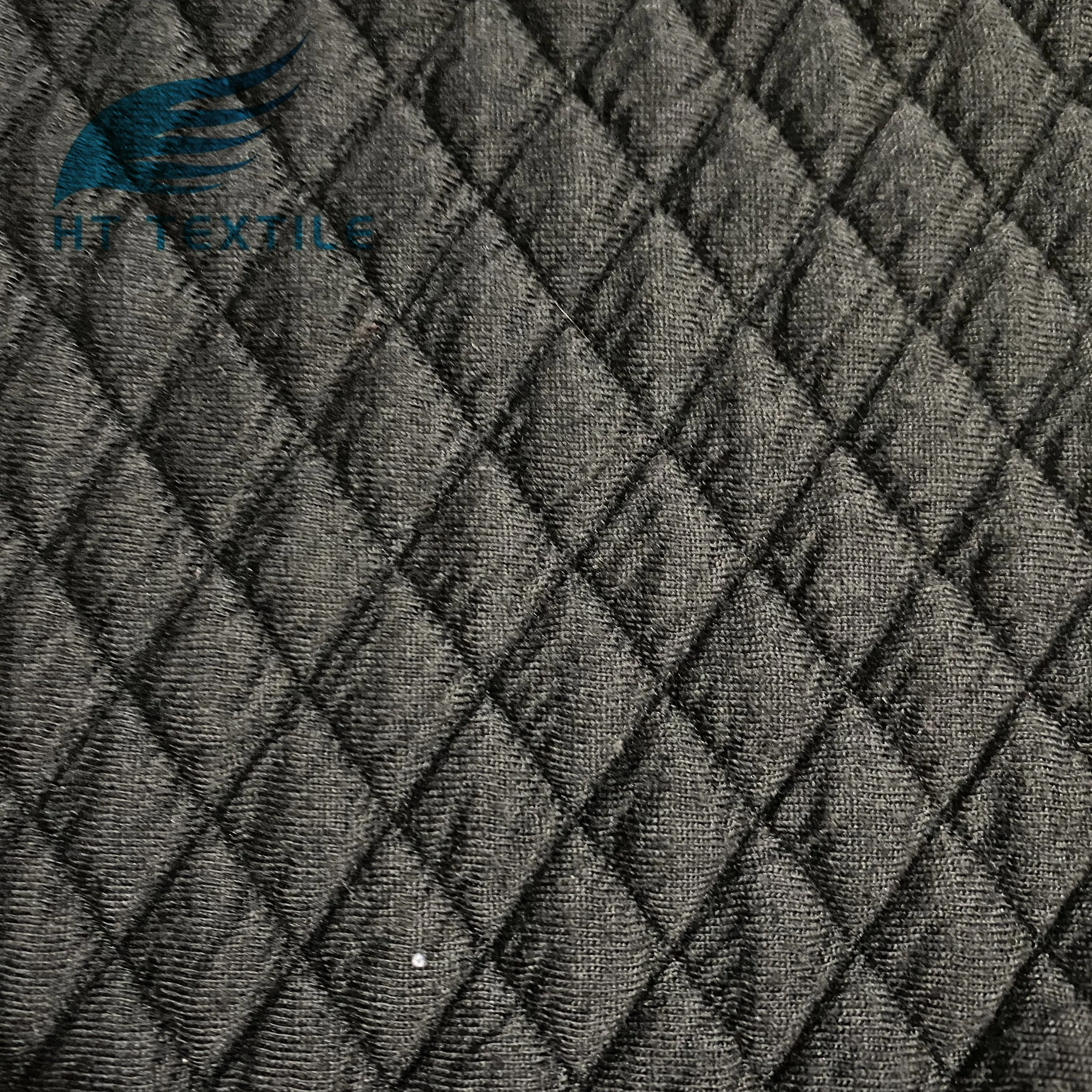 China manufacturer cotton polyester CVC silk jacquard quilted black argyle pattern knit fabric for winter garments