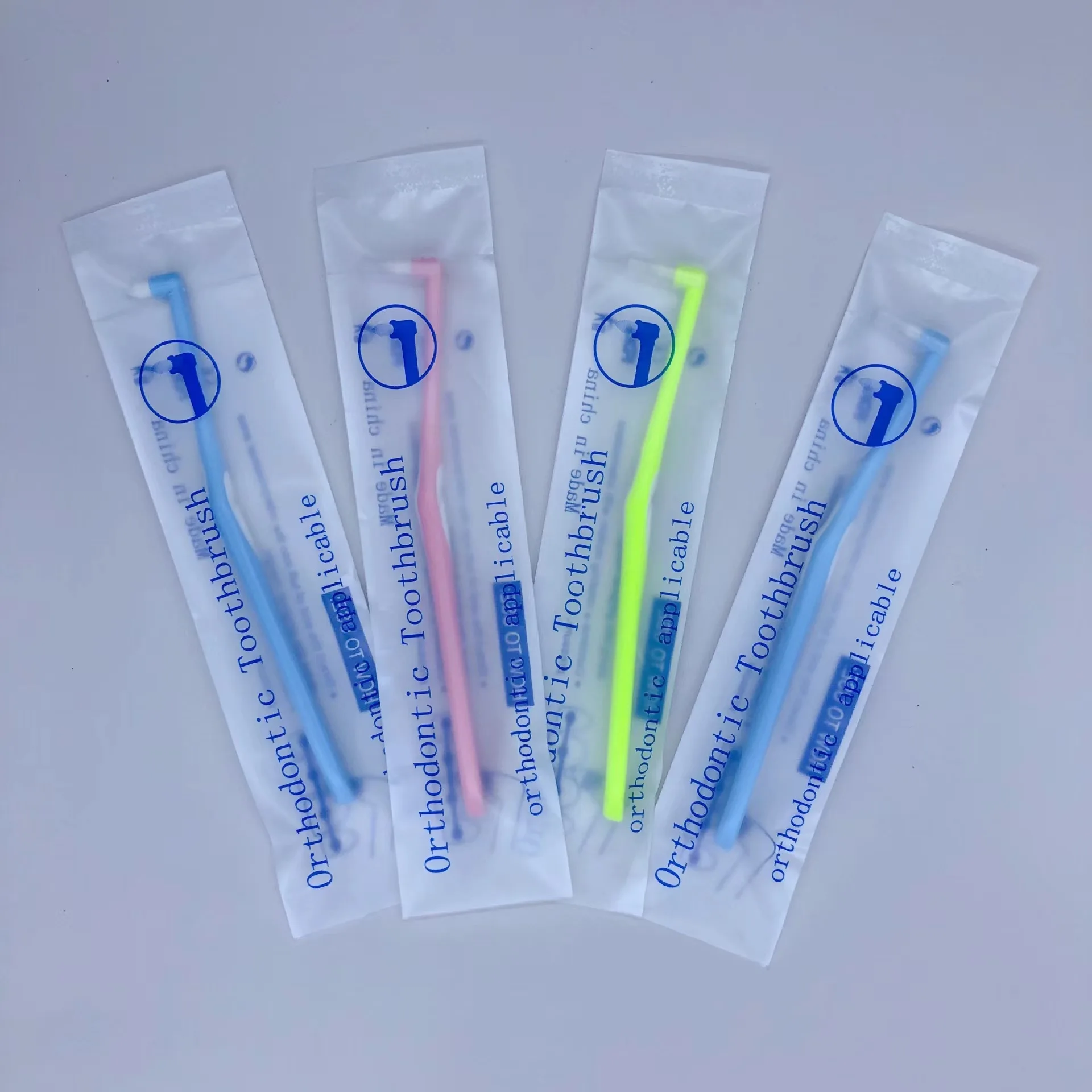 Hot selling custom logo L-shaped orthodontic toothbrush with single bundle brush