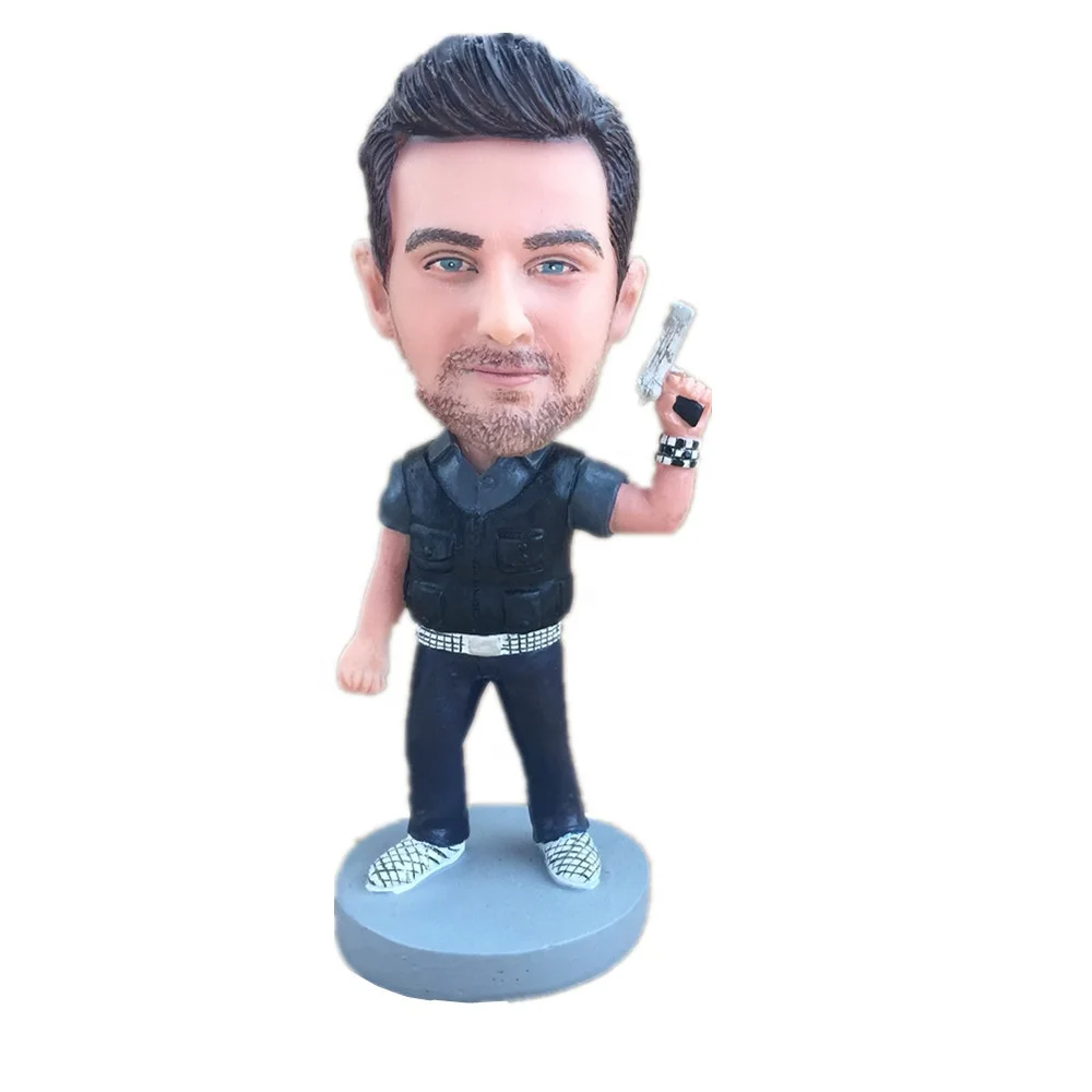 British Police man bobble head doll Male policeman shaking head doll for sale