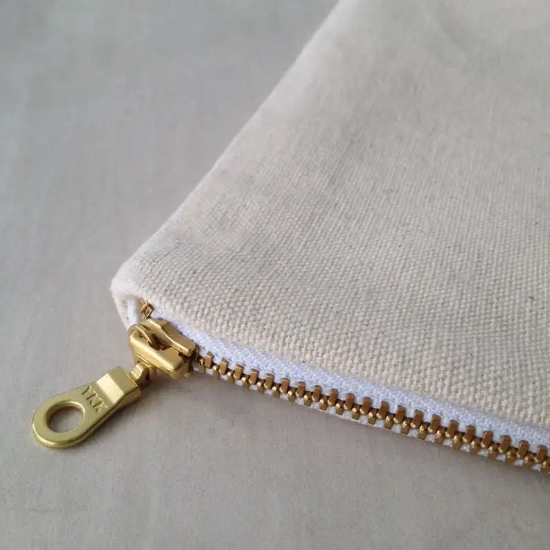 
Canvas Zipper Pouch. Choose between 5 sizes. Natural Cotton Canvas with Gold Zipper. 