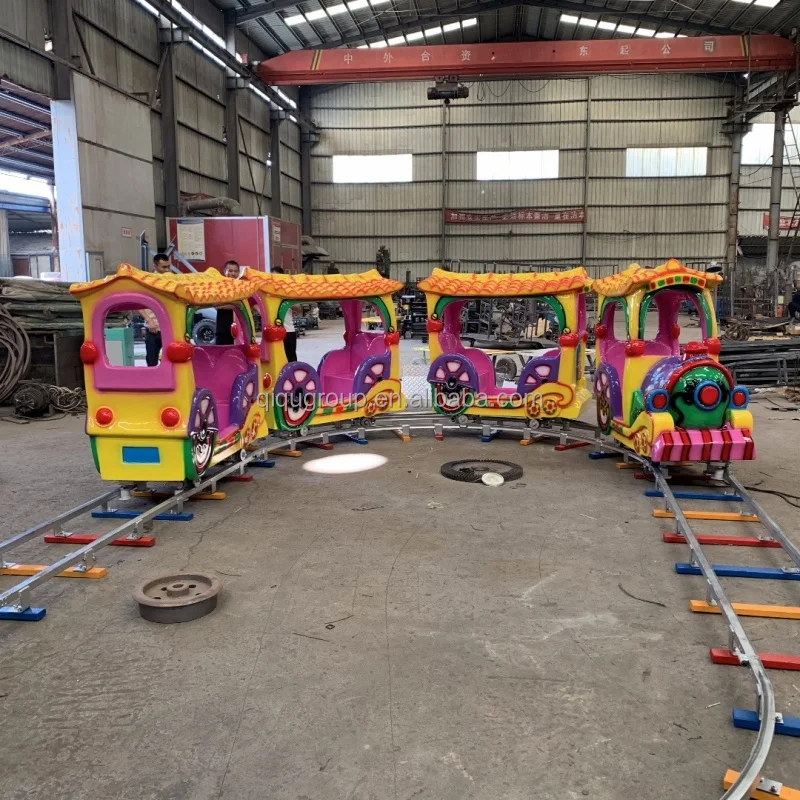 Cartoon style 4 carriages kids ride on train and track mini elephant track train