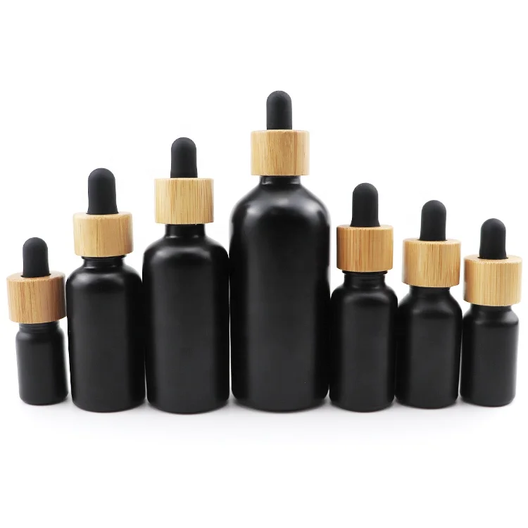 luxury empty packaging cosmetics bamboo 10 ml round black bottles 10ml glass essential oil dropper bottle for essential oils