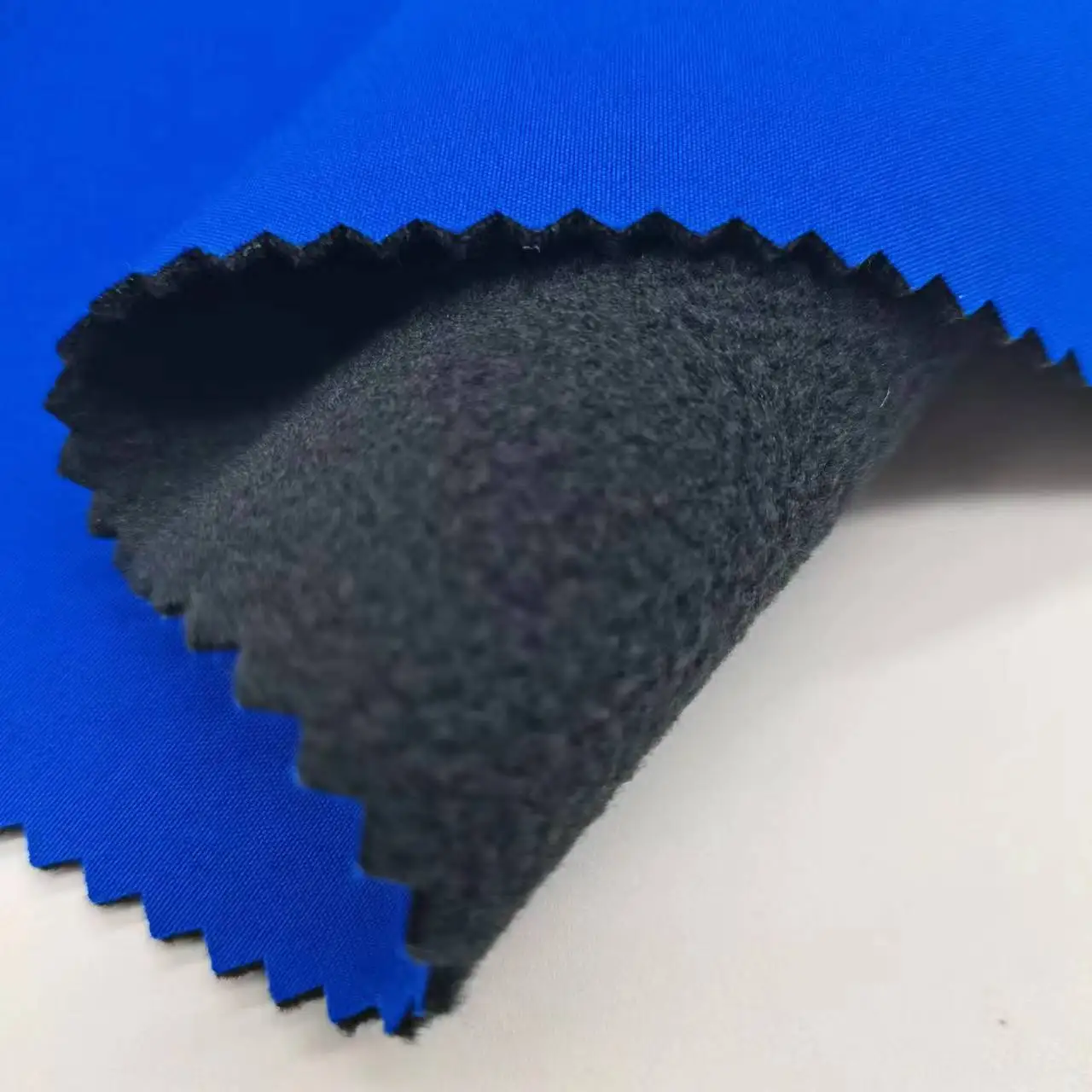 Polyester spandex fabric bonded polar fleece waterproof softshell jacket fabric